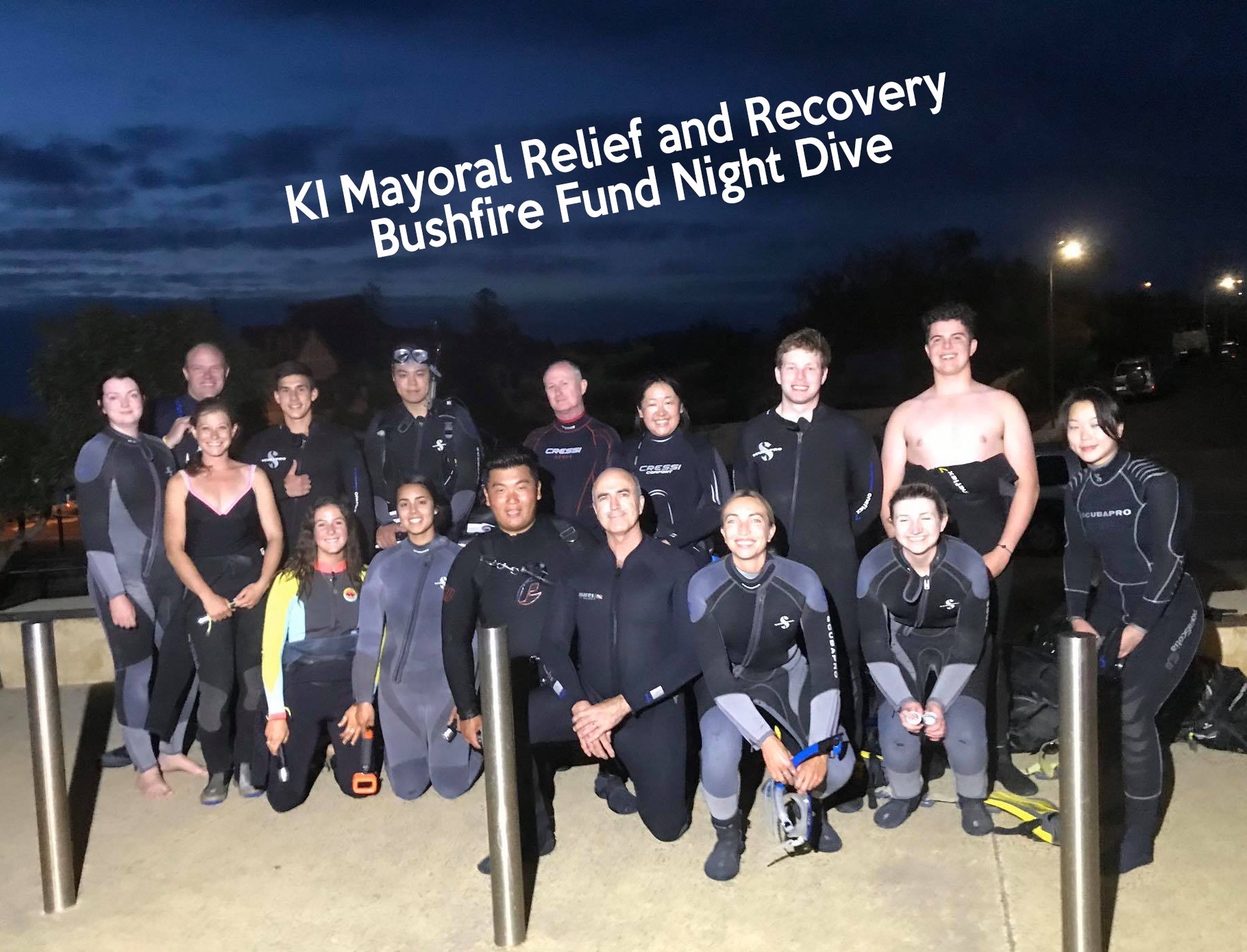 Sienna with a diving group before a night dive