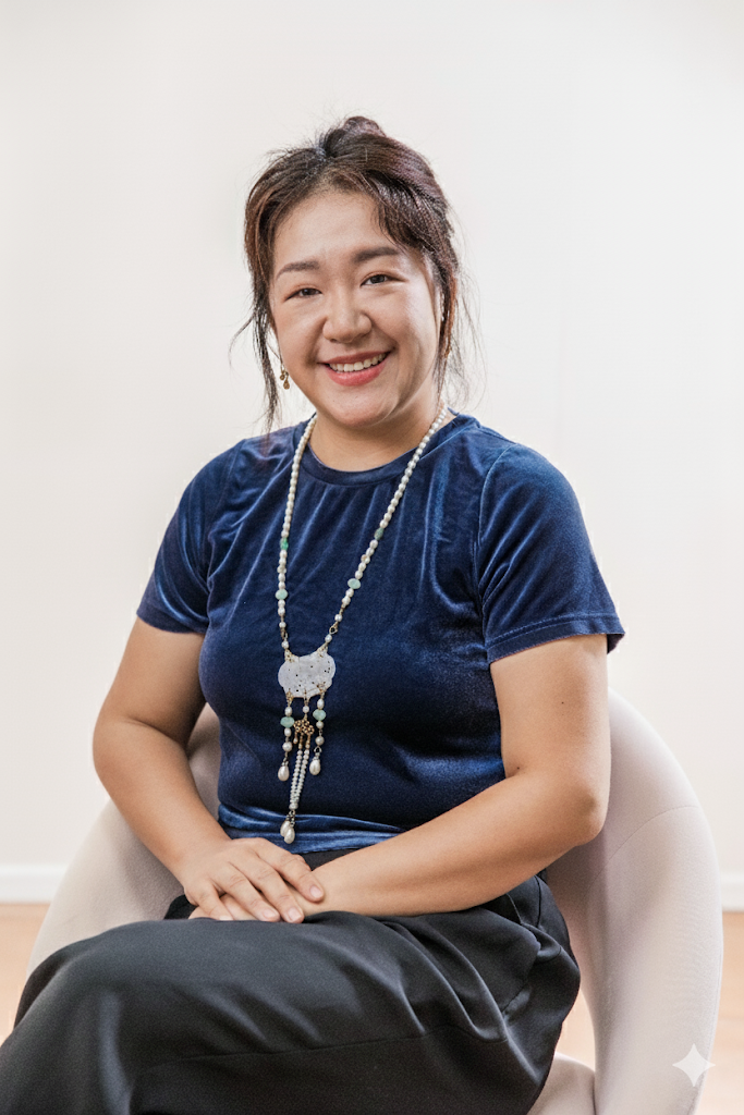 Portrait of Sienna smiling in clinic